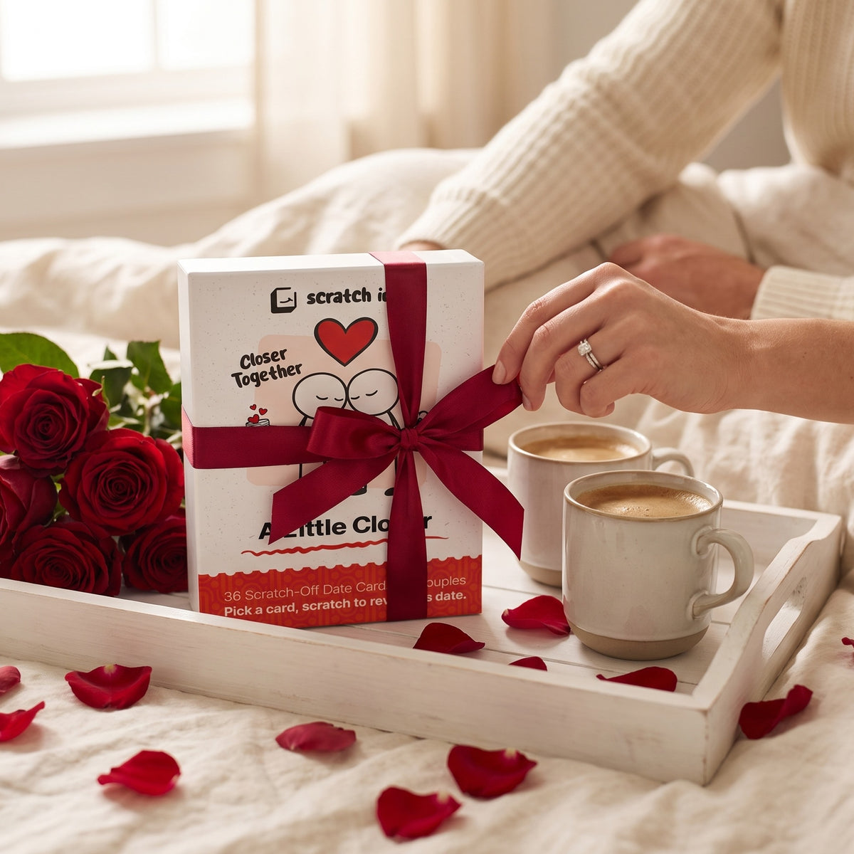 A Little Closer tied with a red ribbon on a Valentine's breakfast tray with roses