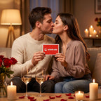 Couple sharing a kiss while holding an A Little Closer card