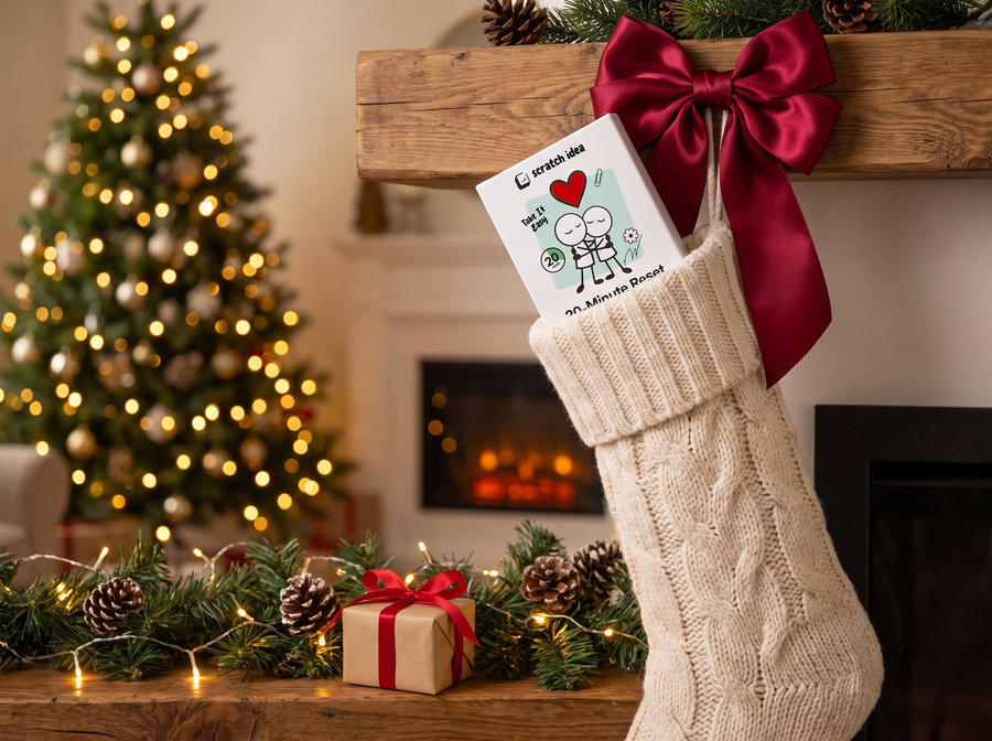 A Scratch Idea 20-Minute Reset box tucked in a Christmas stocking with a red bow